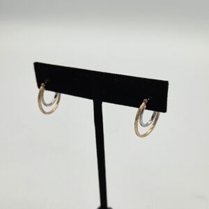 Two-tone 14k gold double hoop earrings white and yellow gold textured
